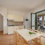 Semesterbostad Residenza Le Farfalle Tergu